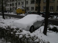 Snow on a car in Karlsruhe