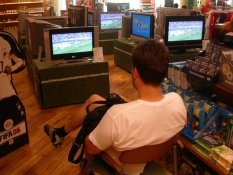 Andr� Odeblom watching football in Karstadt department store