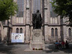 Johann Sebastian Bach in front of the St Thomas Church in Leipzig